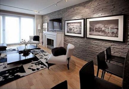 Штучний камінь в інтер'єрі вітальні: дизайнерські прийоми оздоблення та декору